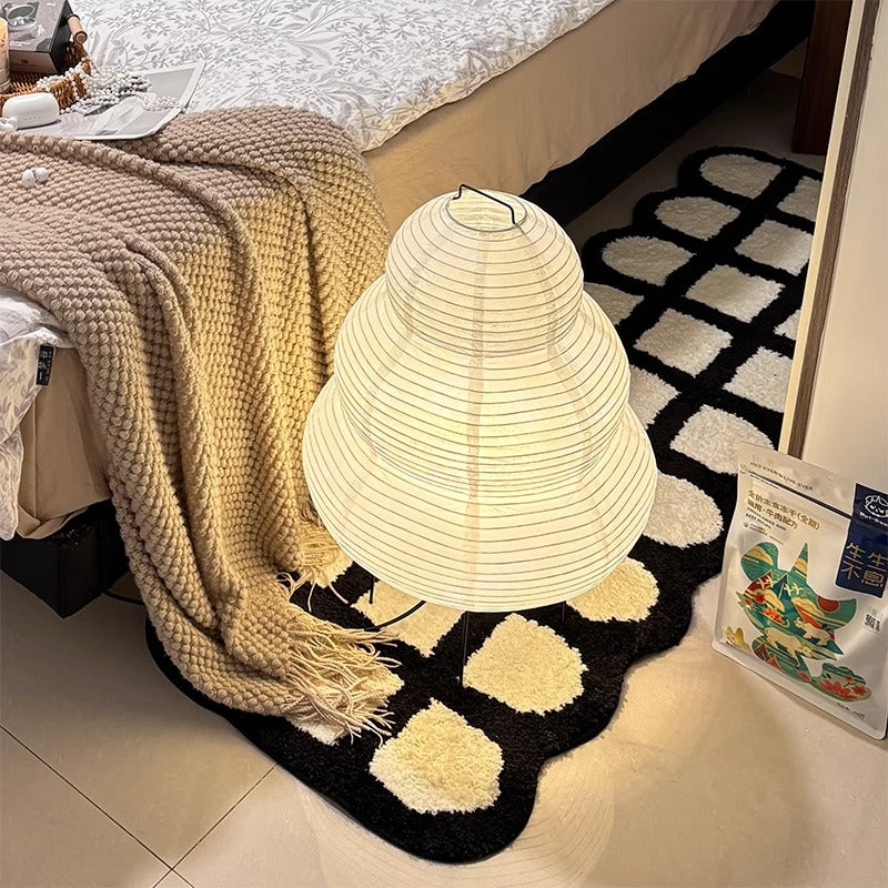 Encountering warmth: the light and shadow poems of paper floor lamps