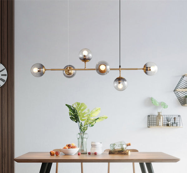 Long lustre de salle à manger en verre en forme de haricot magique