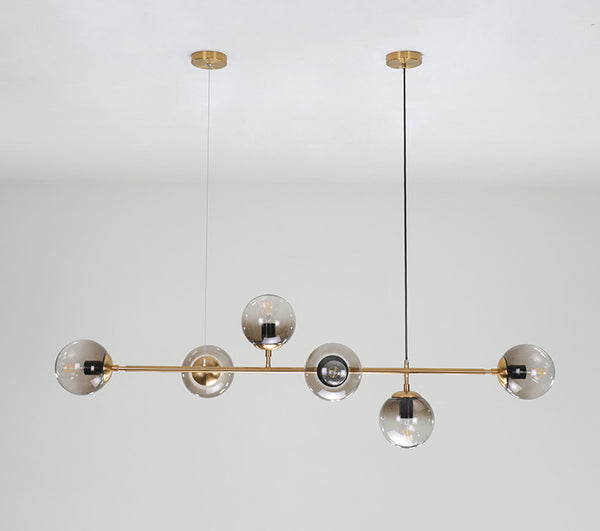 Long lustre de salle à manger en verre en forme de haricot magique