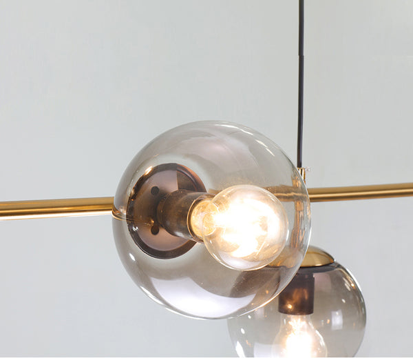 Long lustre de salle à manger en verre en forme de haricot magique