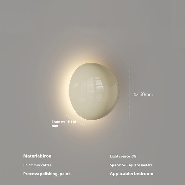 Cremefarbene Wandlampe fürs Schlafzimmer