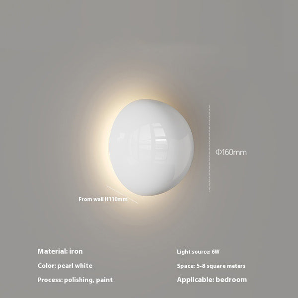 Cremefarbene Wandlampe fürs Schlafzimmer