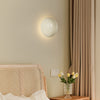 Cremefarbene Wandlampe fürs Schlafzimmer