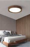Einfache runde Deckenlampe für Schlafzimmer mit Holzmaserung