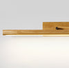 Wandlampe aus massivem Holz mit langem Spiegel
