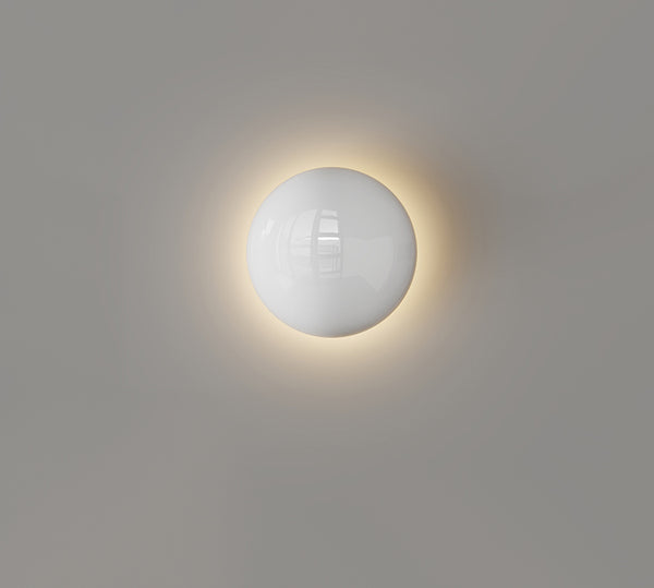 Cremefarbene Wandlampe fürs Schlafzimmer