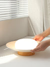 Deckenlampe aus cremefarbenem Strohhut