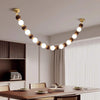 Lustre boule en bois massif à longues bandes de style médiéval