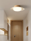 Deckenlampe aus cremefarbenem Strohhut