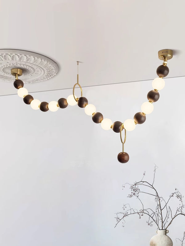 Lustre boule en bois massif à longues bandes de style médiéval