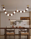 Lustre boule en bois massif à longues bandes de style médiéval