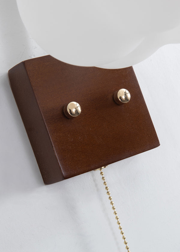 Kreative Wandlampe aus Massivholz in Baumwollform