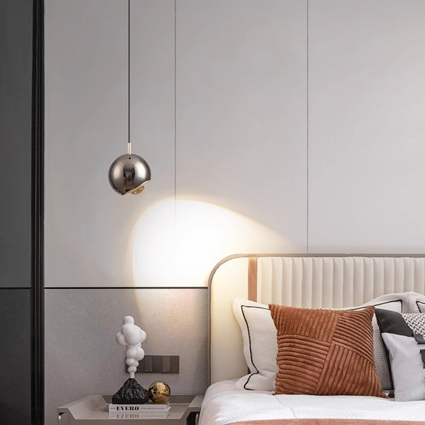 Suspended and adjustable chandelier