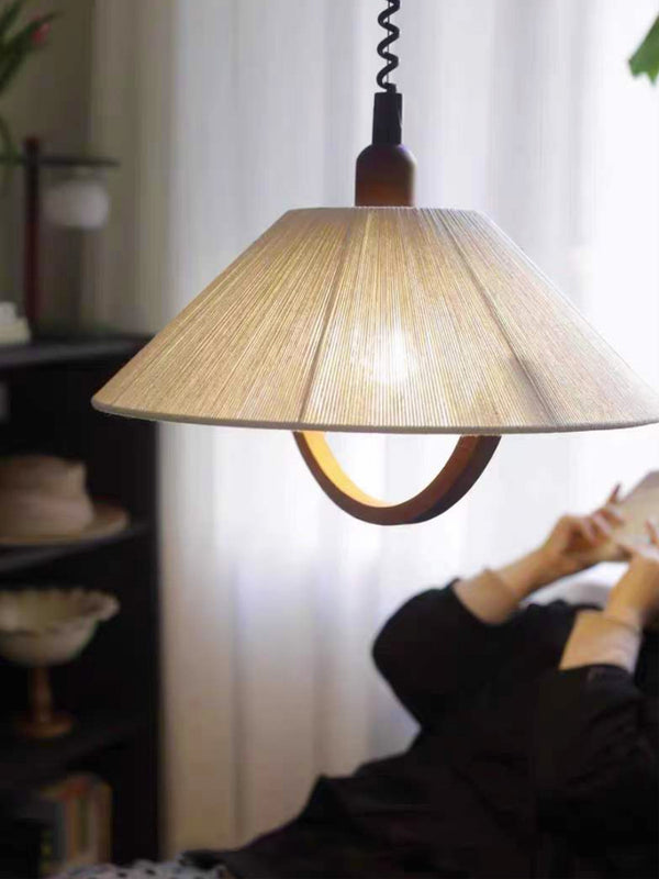 Lustre relevable en forme de bûche