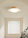 Deckenlampe aus cremefarbenem Strohhut