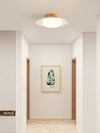 Deckenlampe aus cremefarbenem Strohhut