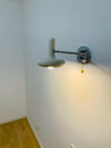 Lampe de poche murale à bascule