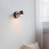 Rotatable bedroom solid wood wall lamp