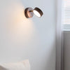 Rotatable bedroom solid wood wall lamp