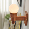 Medieval style solid wood ball wall lamp