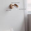 Rotatable bedroom solid wood wall lamp